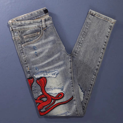 Worn Looking Washed-out Hole Patch Trendy Brand Embroidered Slim Fit Jeans — view 4