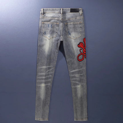 Worn Looking Washed-out Hole Patch Trendy Brand Embroidered Slim Fit Jeans — view 5