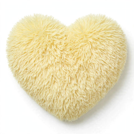 Fluffy shaggy heart pillow in light yellow